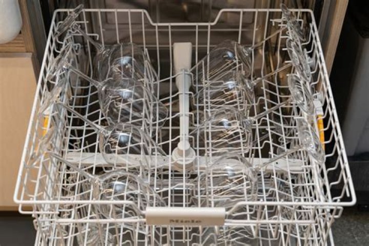 Can I sanitize wine bottles in the dishwasher?