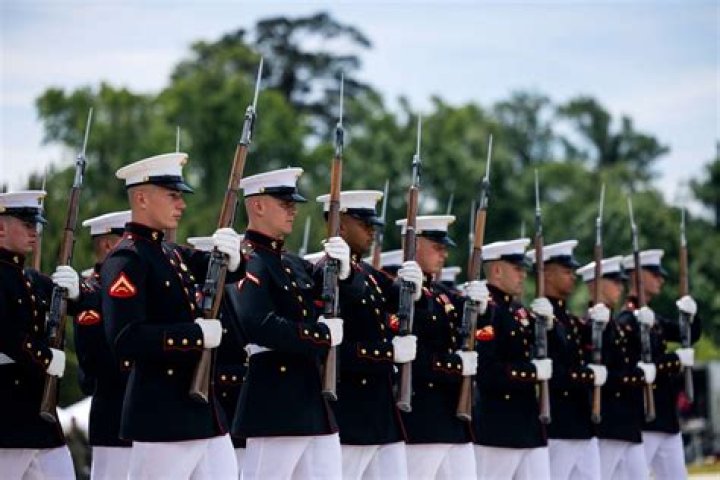 Do enlisted Marines pay for their uniforms?