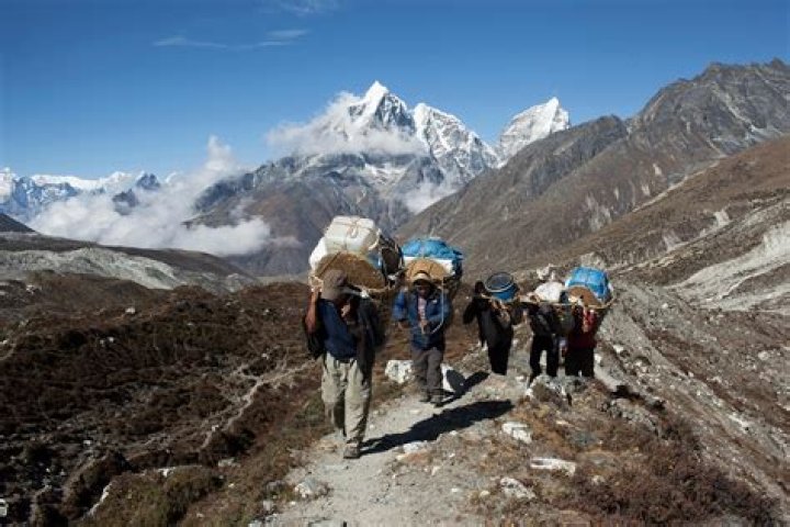 Do Sherpas go to the top of Everest?