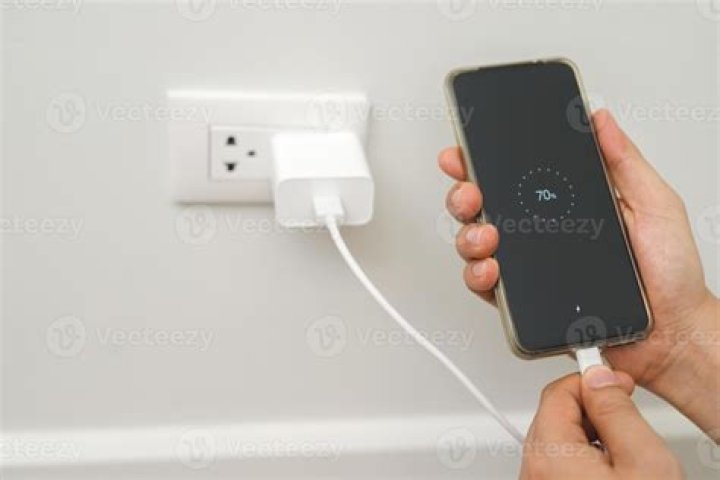 Does leaving phone charger plugged in use electricity?