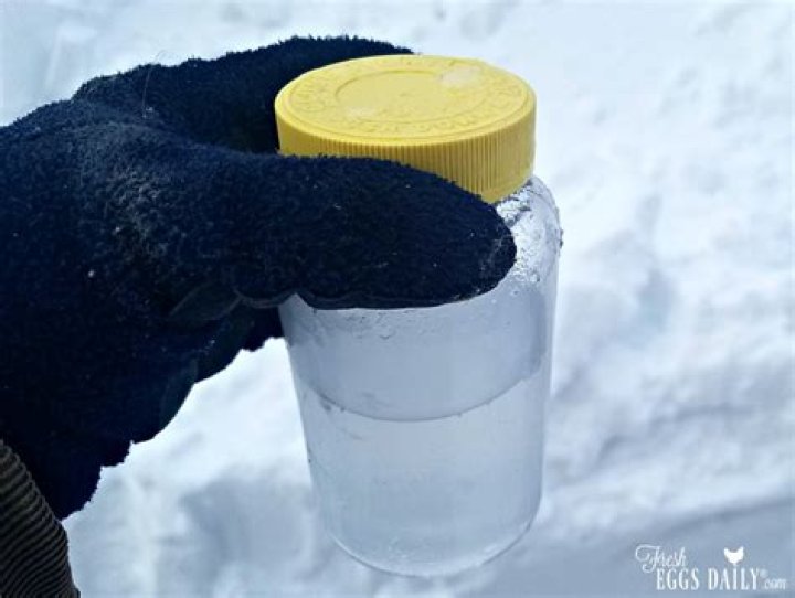 Does putting a bottle of salt water keep water from freezing?
