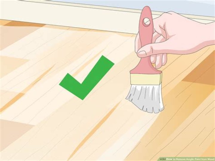 How do you get dried paint off of stained wood?