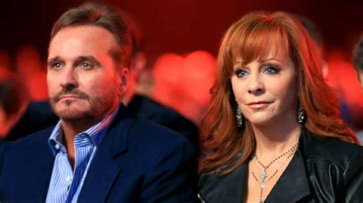 How much did Reba pay in divorce?