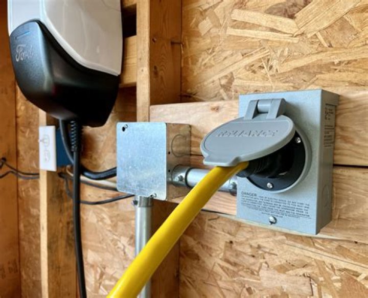 Is it OK to run extension cord through wall?