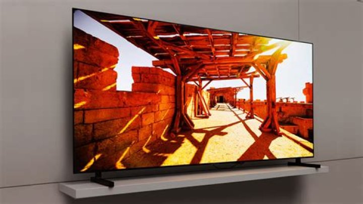Is it OK to touch an OLED TV screen?