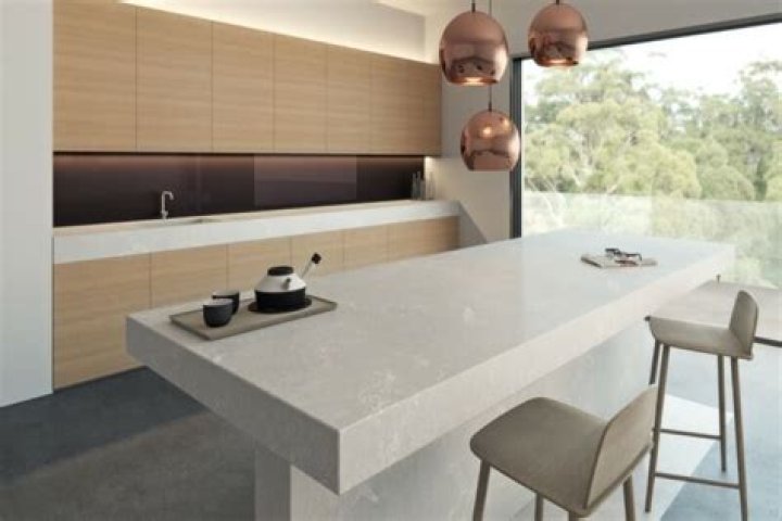 Is quartz stronger than Corian?