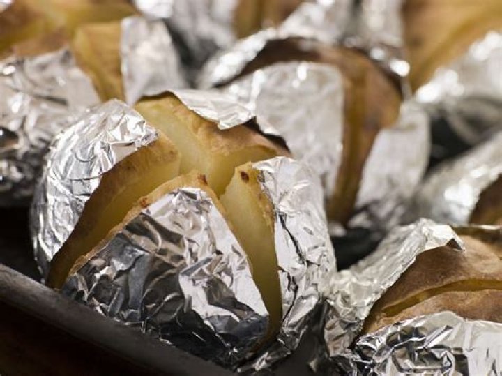 Should baked potatoes be wrapped in foil?