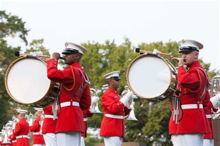 What do the drums and bugles represent?