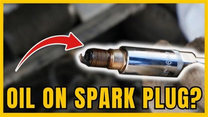 What do you spray inside a spark plug hole?