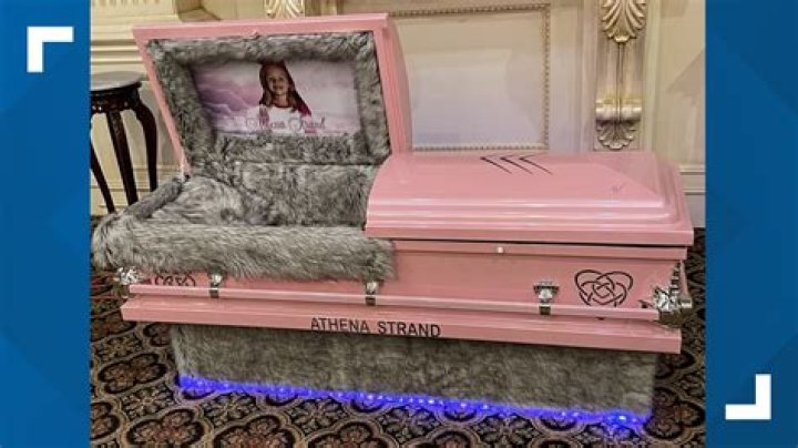 What does wearing pink to a funeral mean?