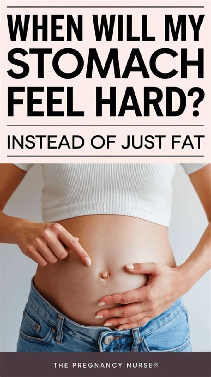 Where does your stomach get hard first when pregnant?