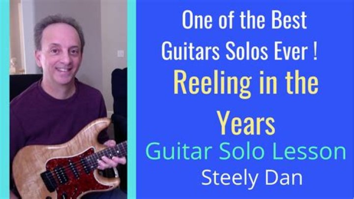 Who played guitar solo on Reeling in the Years?