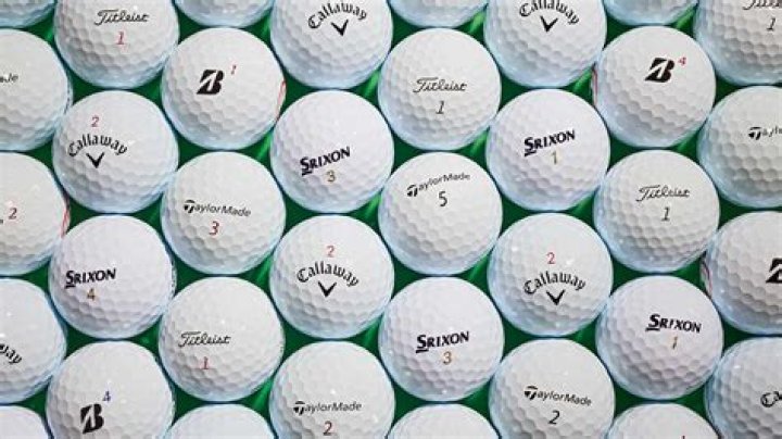 Why do golfers put dots on their golf balls?