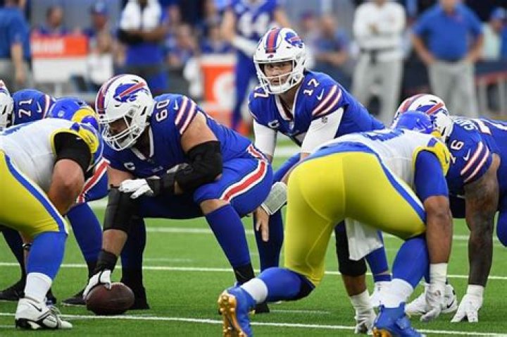 Why do quarterbacks lift their leg?