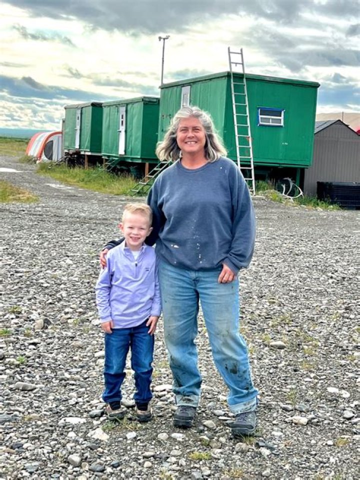 Why does Sue Aikens live in Alaska?
